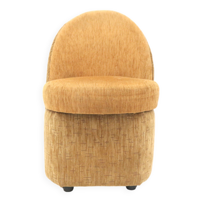 Fauteuil vintage jaune avec rangement fabriqué dans les années 70