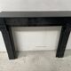 Napoleon III period fireplace with a black marble corbel. 19th century.