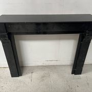Napoleon III period fireplace with a black marble corbel. 19th century.
