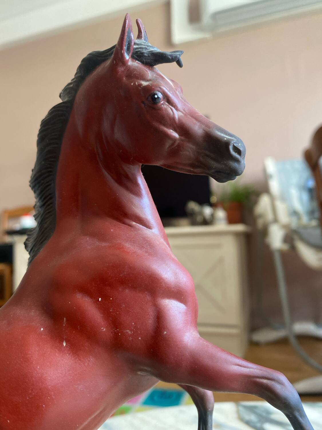 Porcelain horse statue (the red pony)