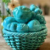 Vintage green earthenware plate/basket with fruit decorations.