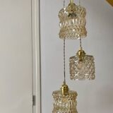 Triple antique globe pendant light in amber glass