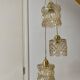 Triple antique globe pendant light in amber glass