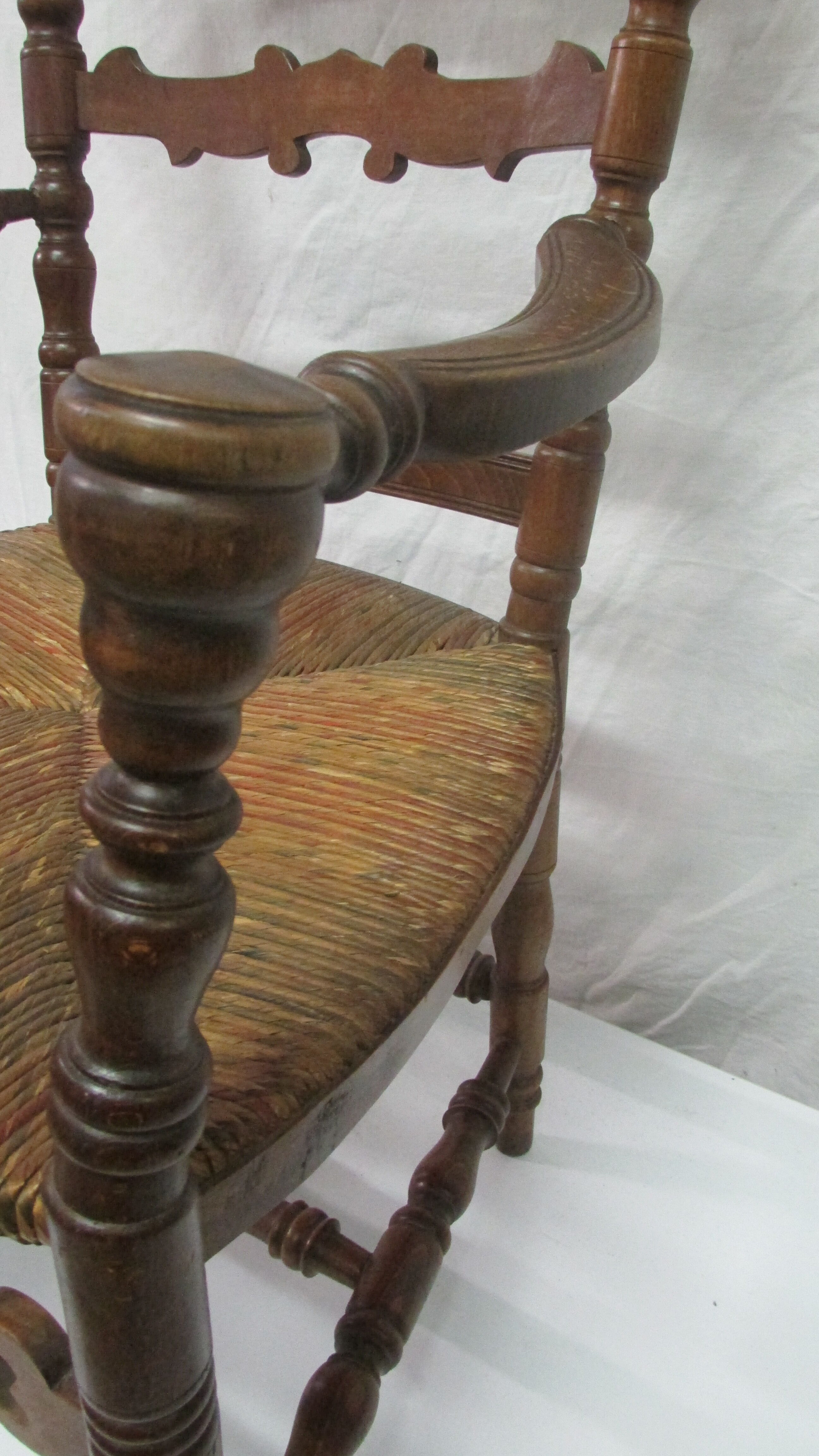 Antique armchair with armrests