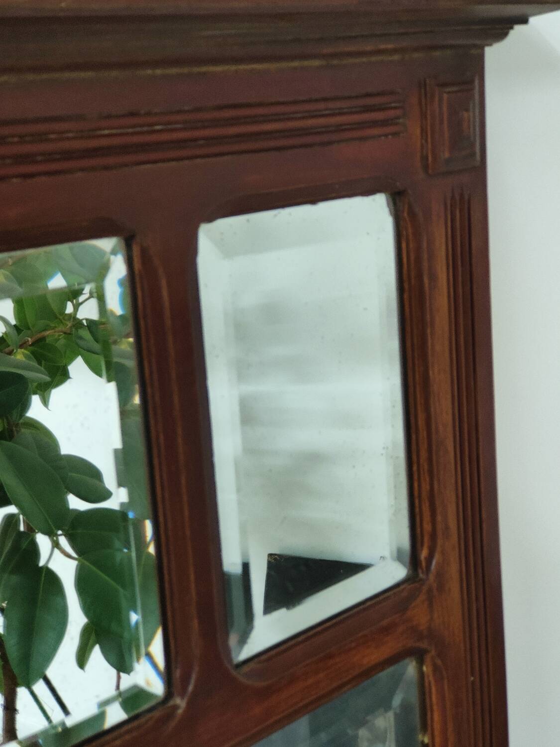 Antique beveled mirror on a wooden frame, 1930