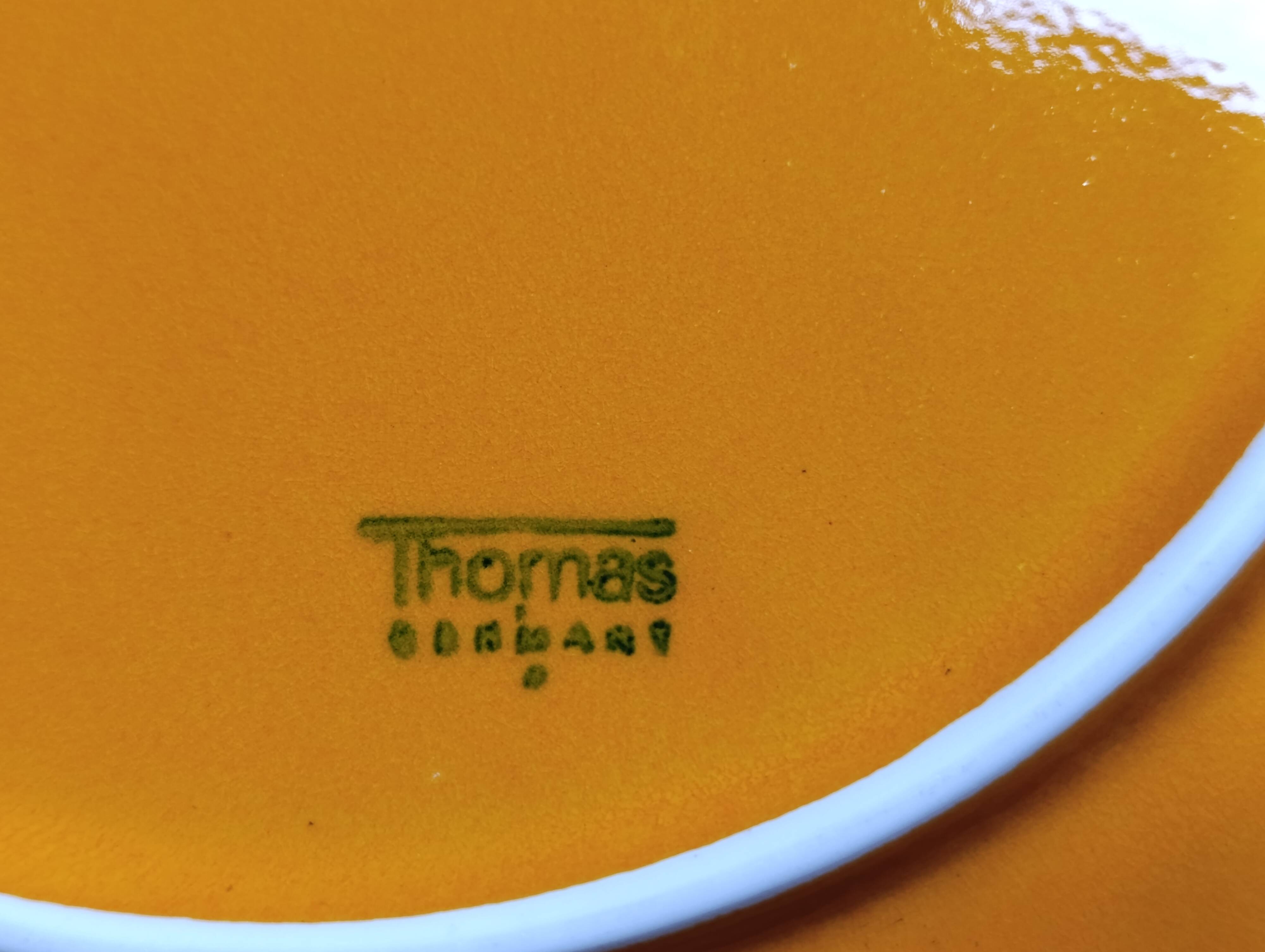Set of three flat plates in glazed ceramic Thomas Germany from the years.