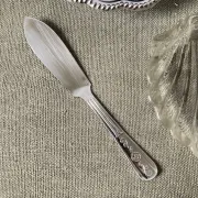 Metal shell butter dish with glass bowl and knife