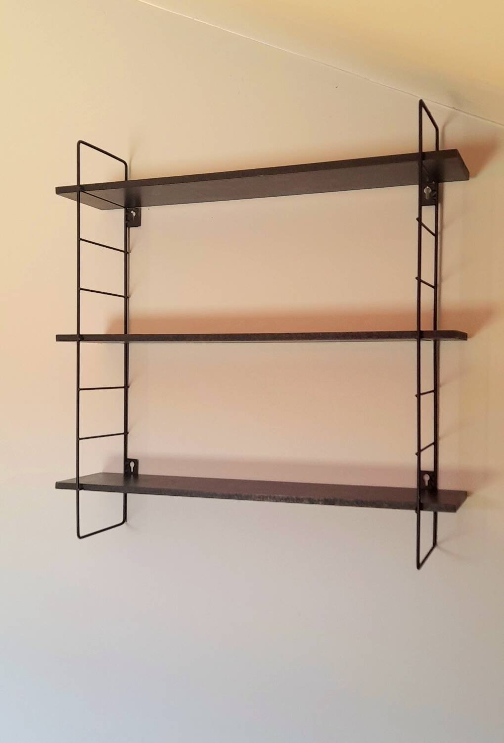 String style wall shelf