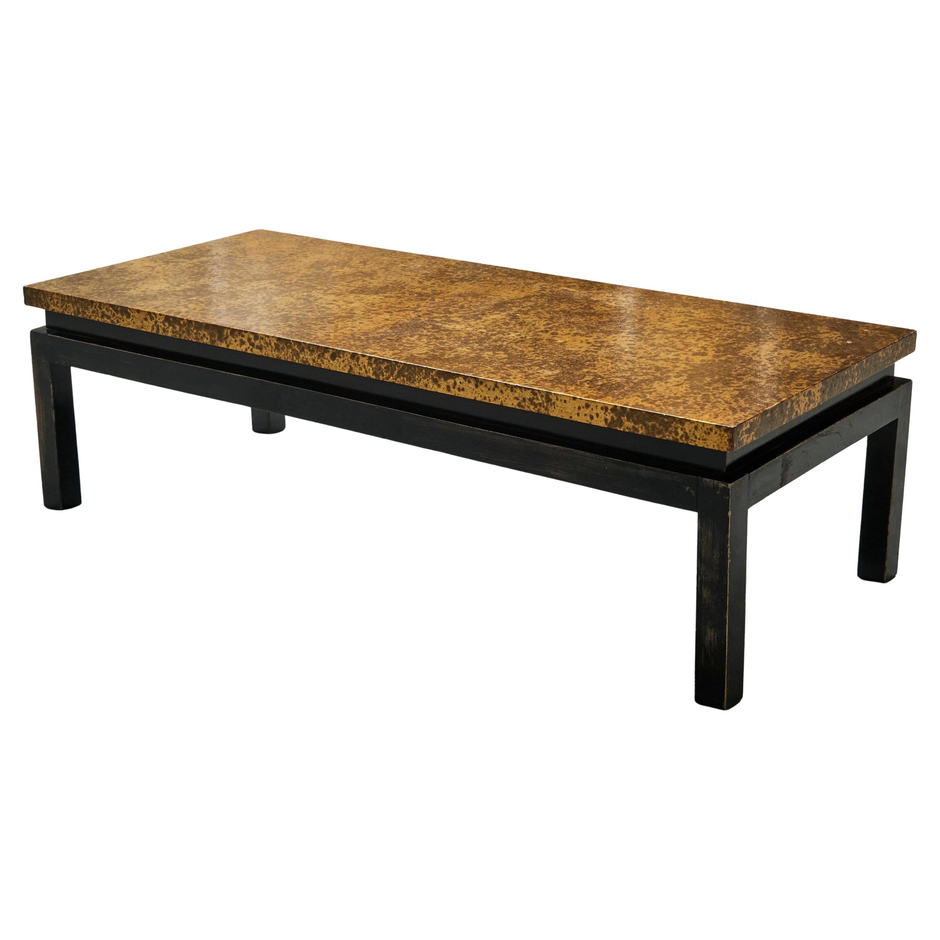 Modernist coffee table with a patinated gold top, 120x52.5x36 cm, mid-20th century.