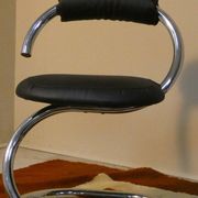 Cobra chairs in steel and black leather by Giotto Stoppino, 1970s, set of 5.
