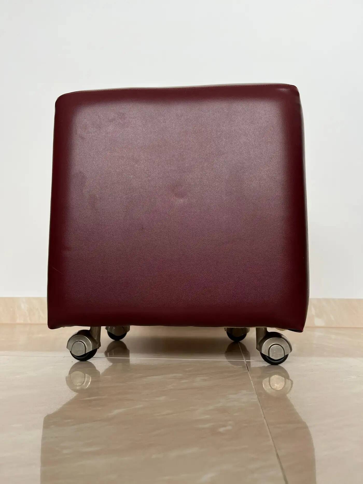 Pair of midcentury design wheel stools or tabourets, artificial leather, 1970s