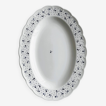 Plat ovale en porcelaine avec bord fleuri bleu boch la louvière.