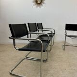 Lot of 4 tubular metal and black leather chairs MG5 Grassi style 70s