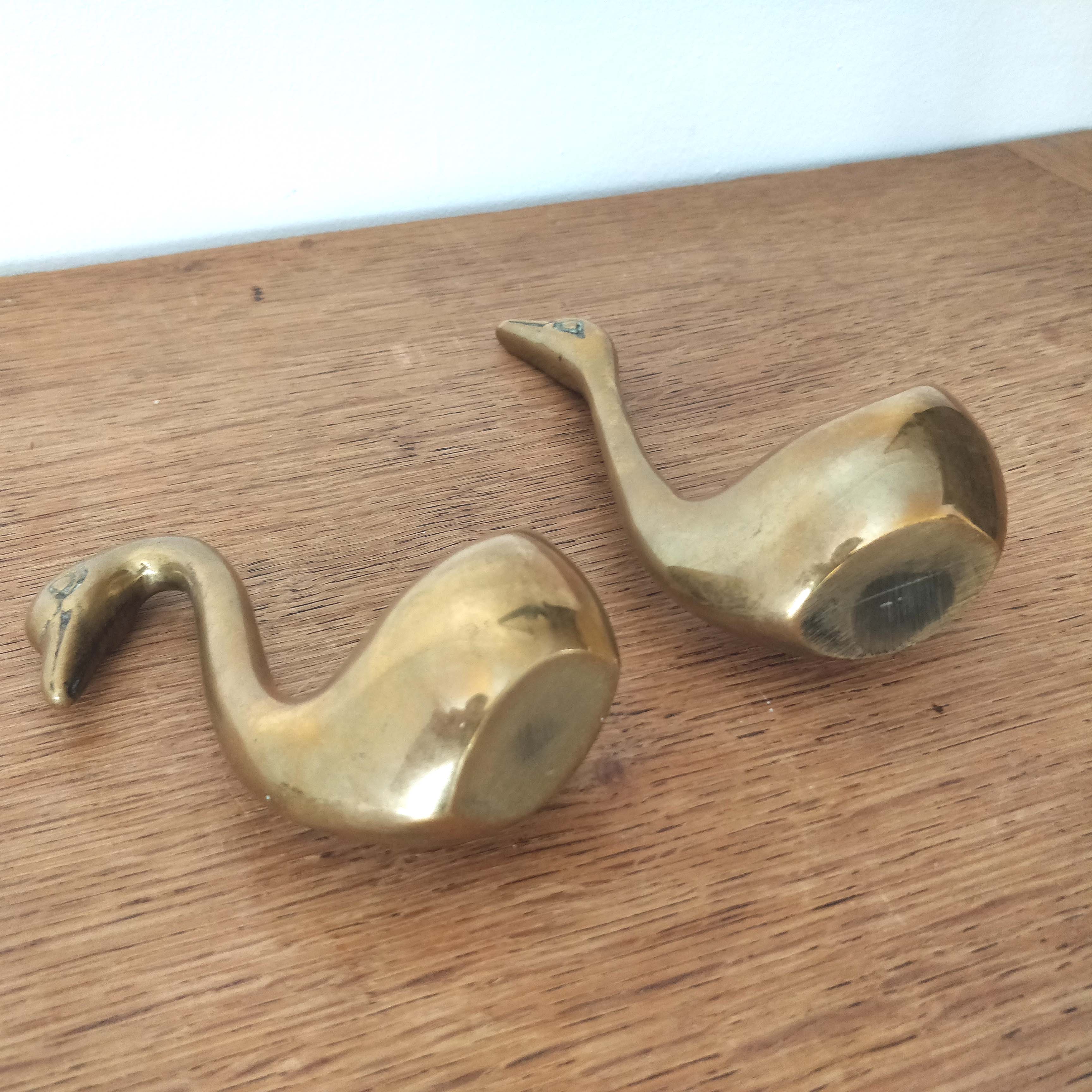 Couple of brass swans