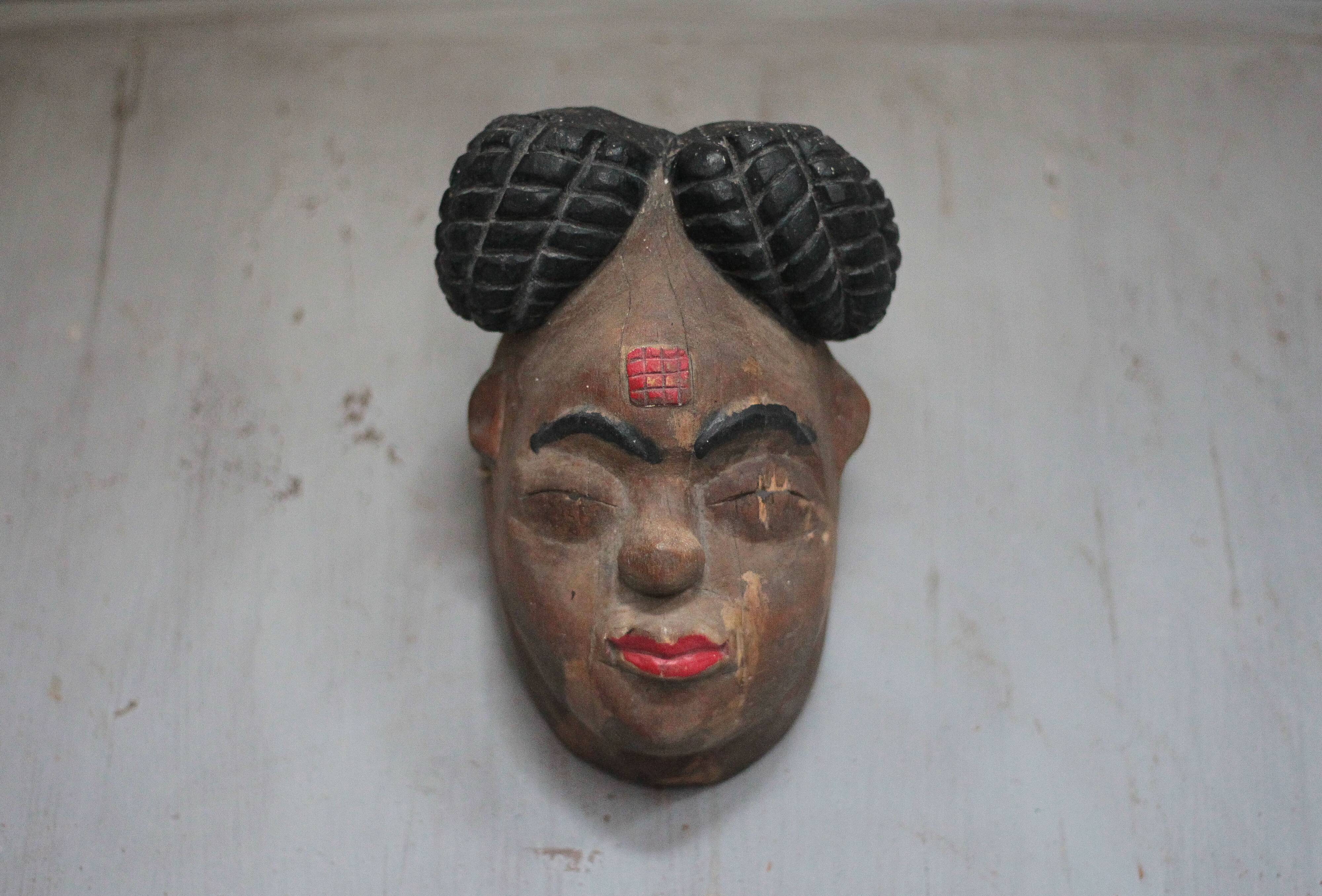Ancient Okuyi mask, Punu mask from Gabon, carved wood, collection, ethnic art.