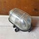 Antique exterior wall light moulded glass & metal grille & black bakelite support