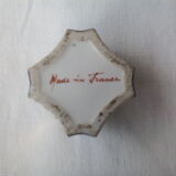 Ink in blue and white earthenware with floral decoration