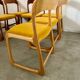 Set of 7 Baumann sled chairs in wood and mustard yellow fabric, 1960s