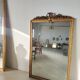 Miroir de cheminée en bois doré à décor de nœud et de roses H : 164 cm