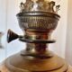 Electrified oil lamp in bronze and hand-painted Gien earthenware