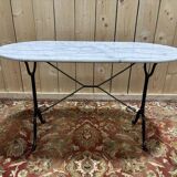 Table bistrot avec plateau ovale en marbre