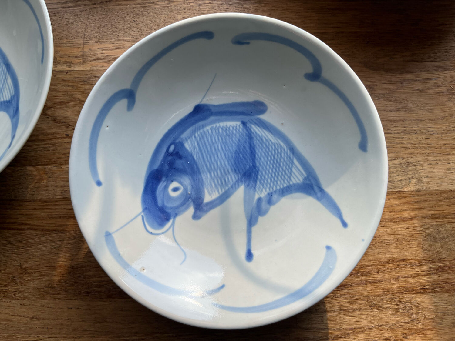 Porcelain plates with carp decoration