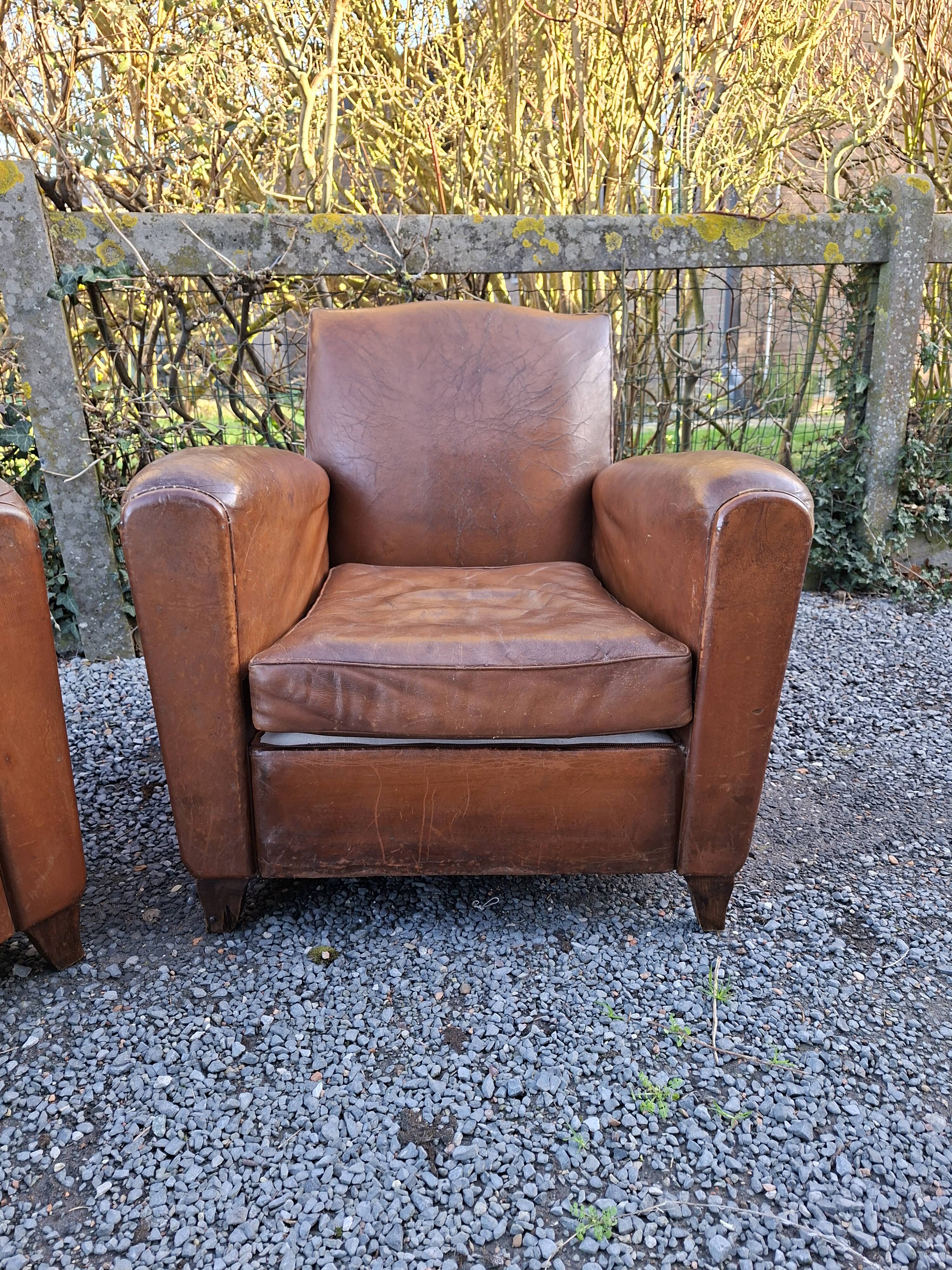 A couple of pairs of genuine restored club armchairs in industrial loft leather.