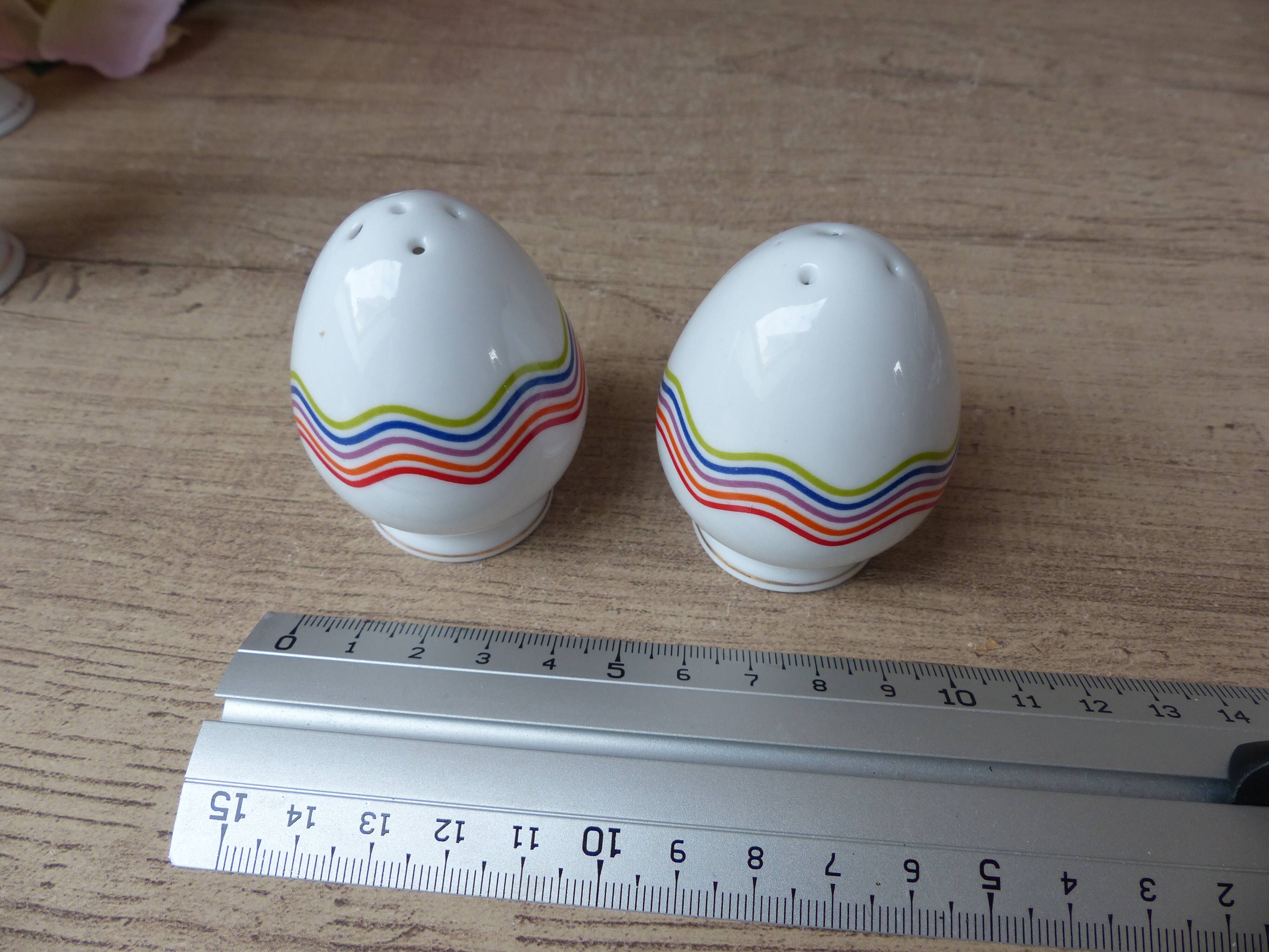 Set of 4 egg cups with spoons, colourful vintage salt and pepper shakers.