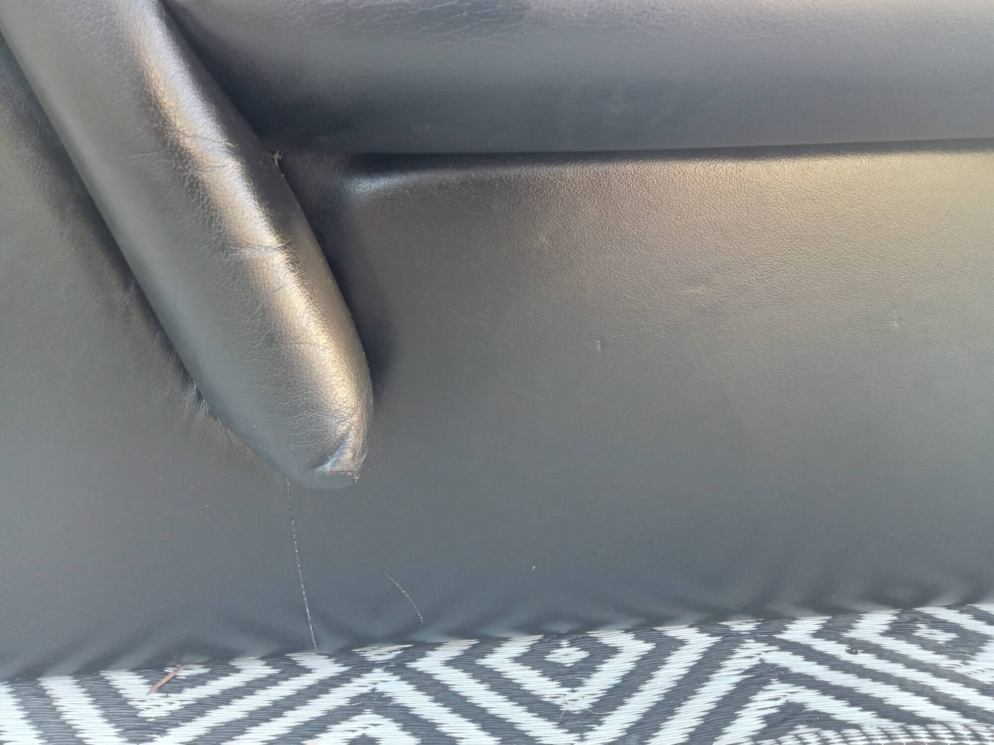 Vintage black leather sofa, 2 seater, Nicoletti Salotti