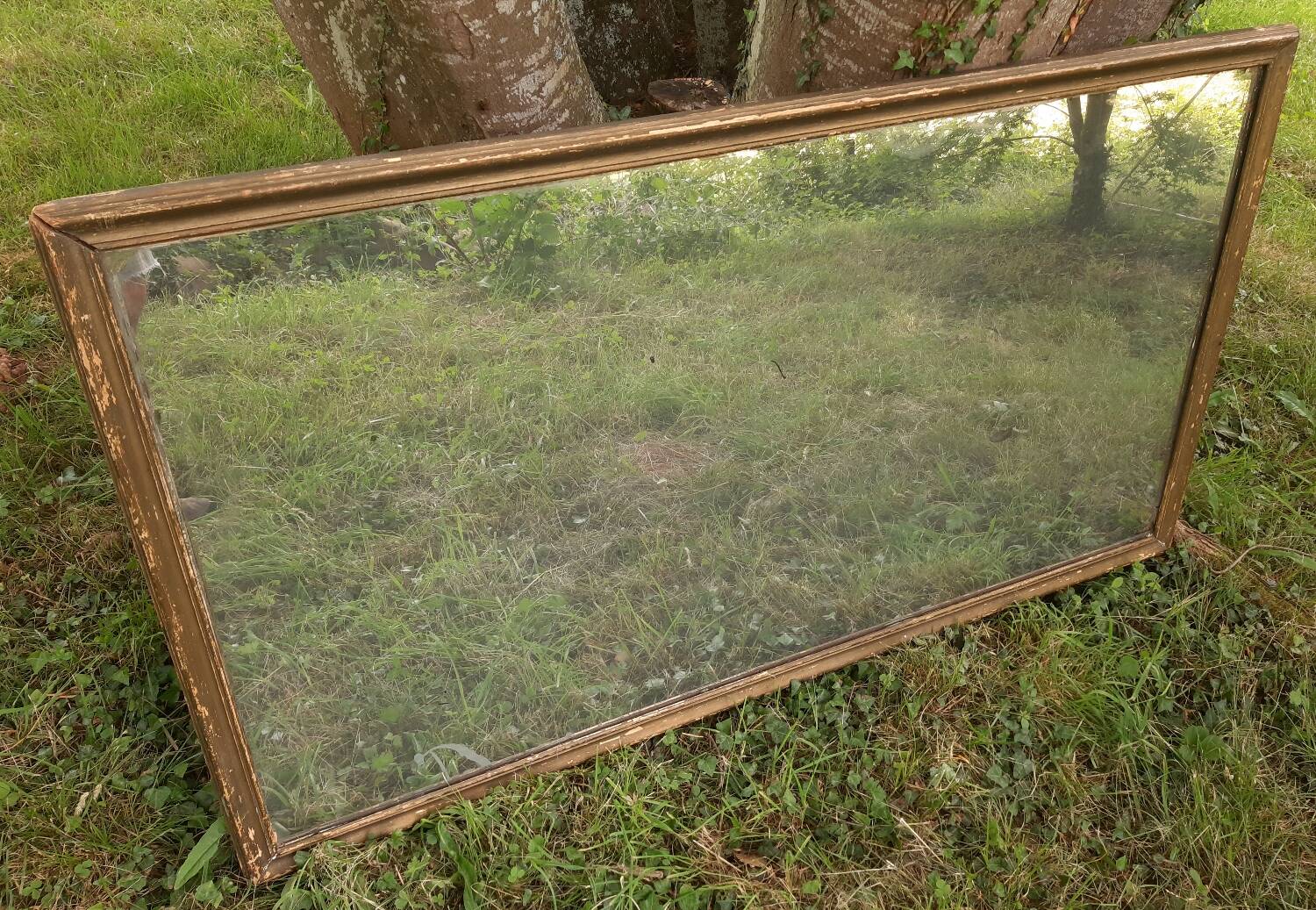 Antique mercury mirror. (Fireplace mirror)