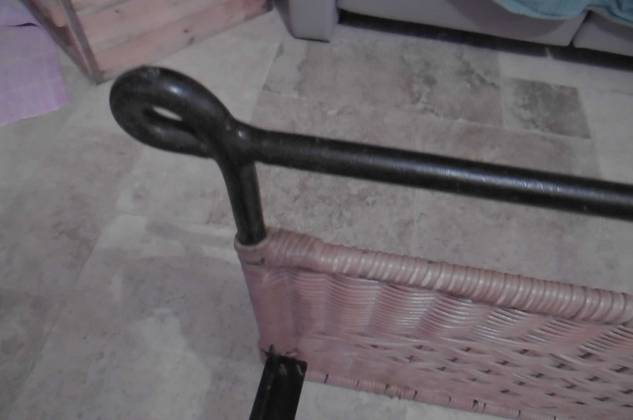 Black metal and rattan bed frame