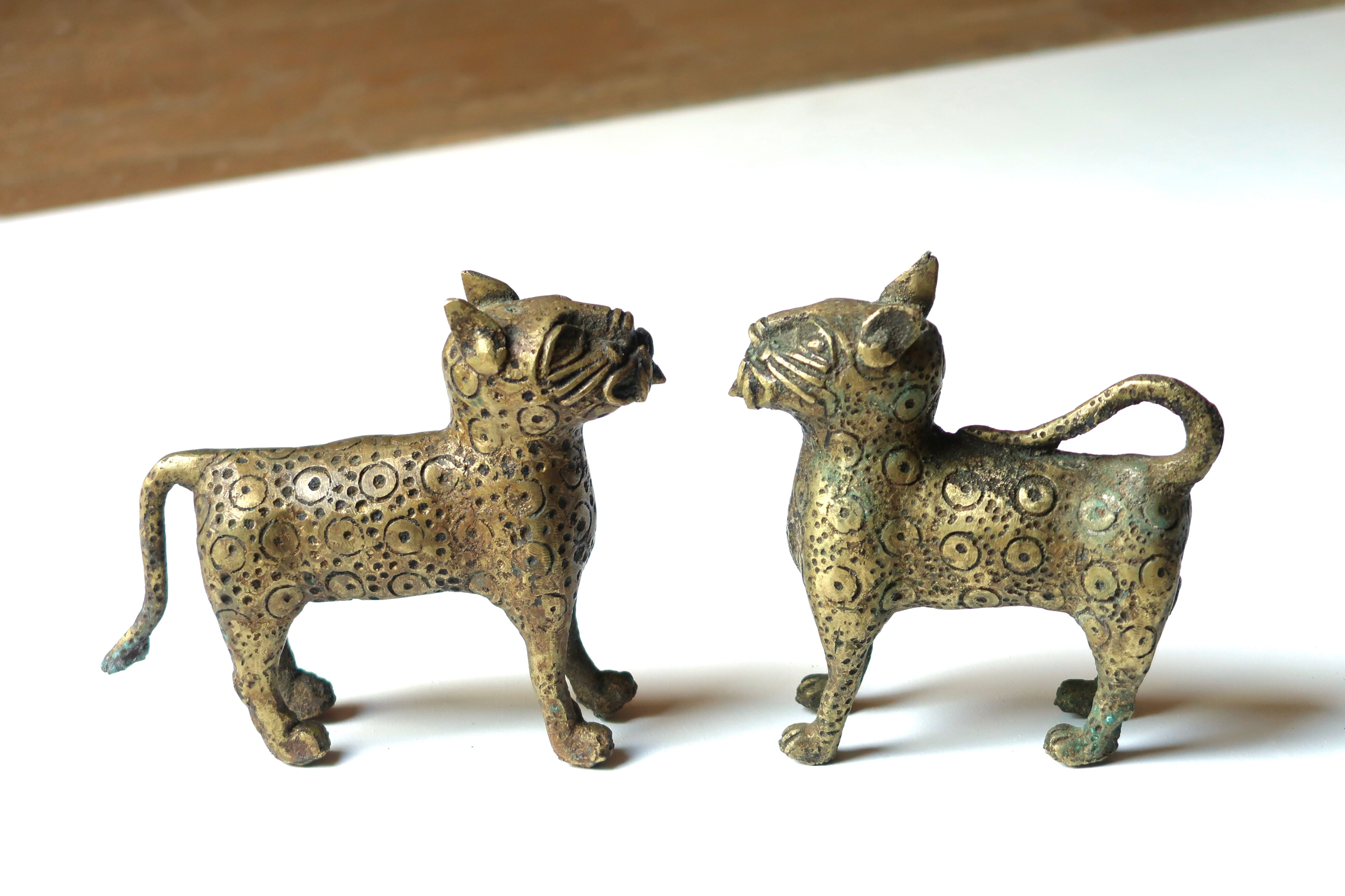 Book greenhouse, bronze leopards, 70s