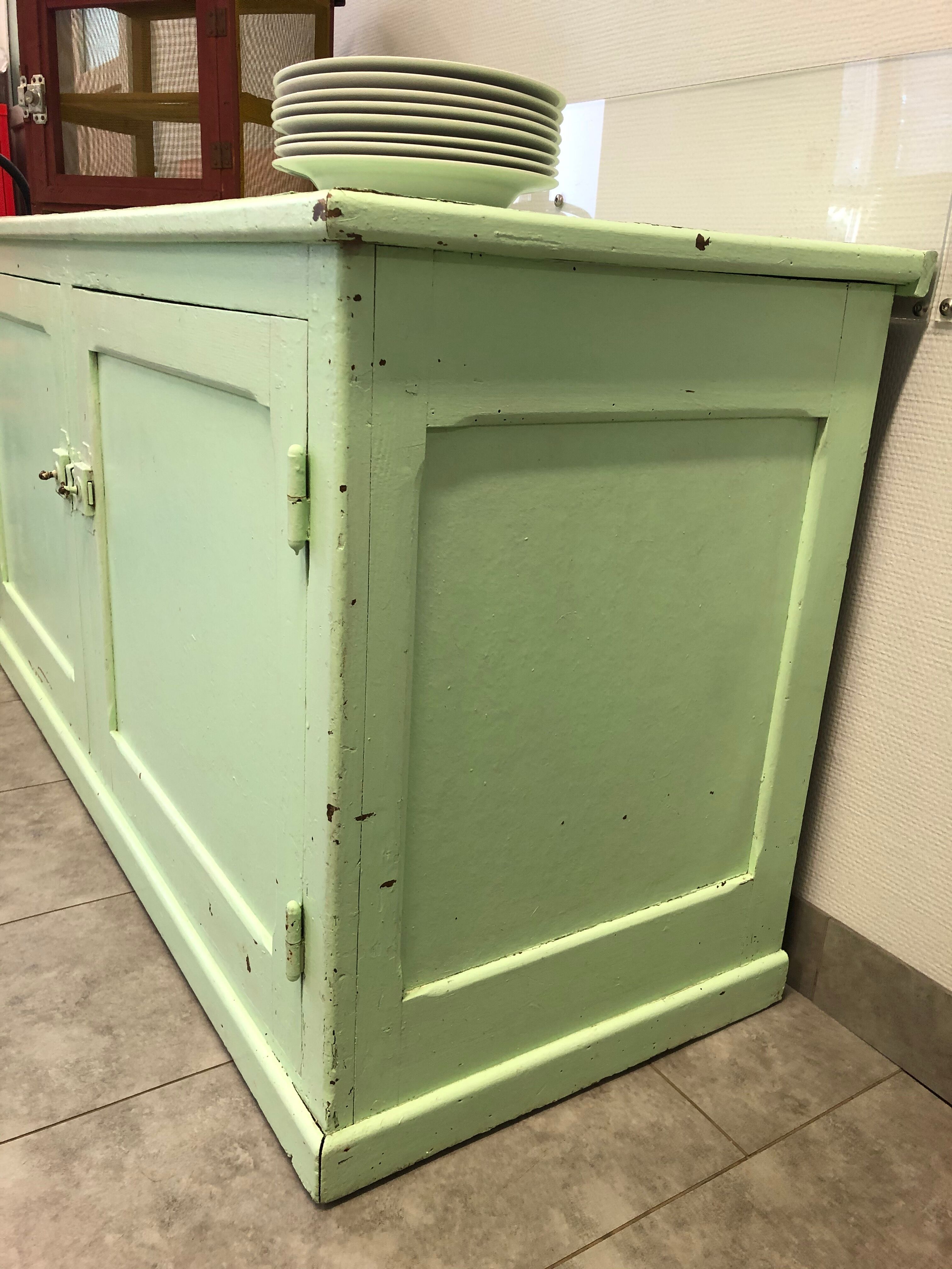 Low green patinated furniture