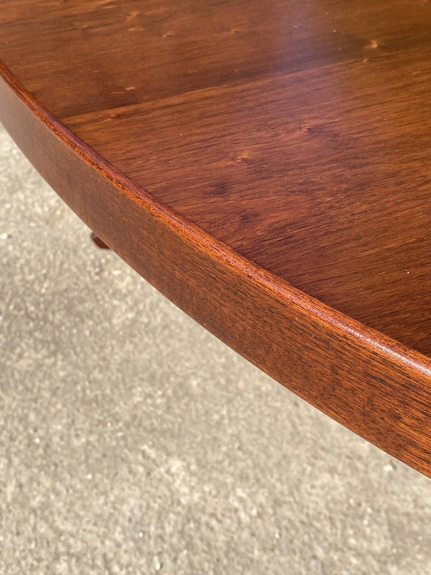 Baumann round oval extendable Scandinavian table in rosewood with 2 extensions.