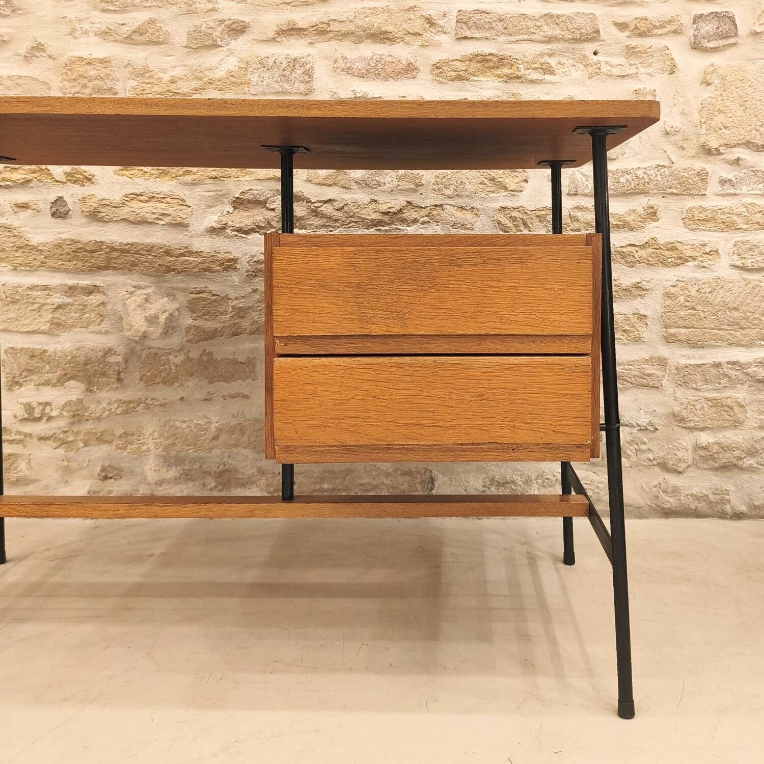 Modernist desk with suspended drawer unit, French work from the 1950s.
