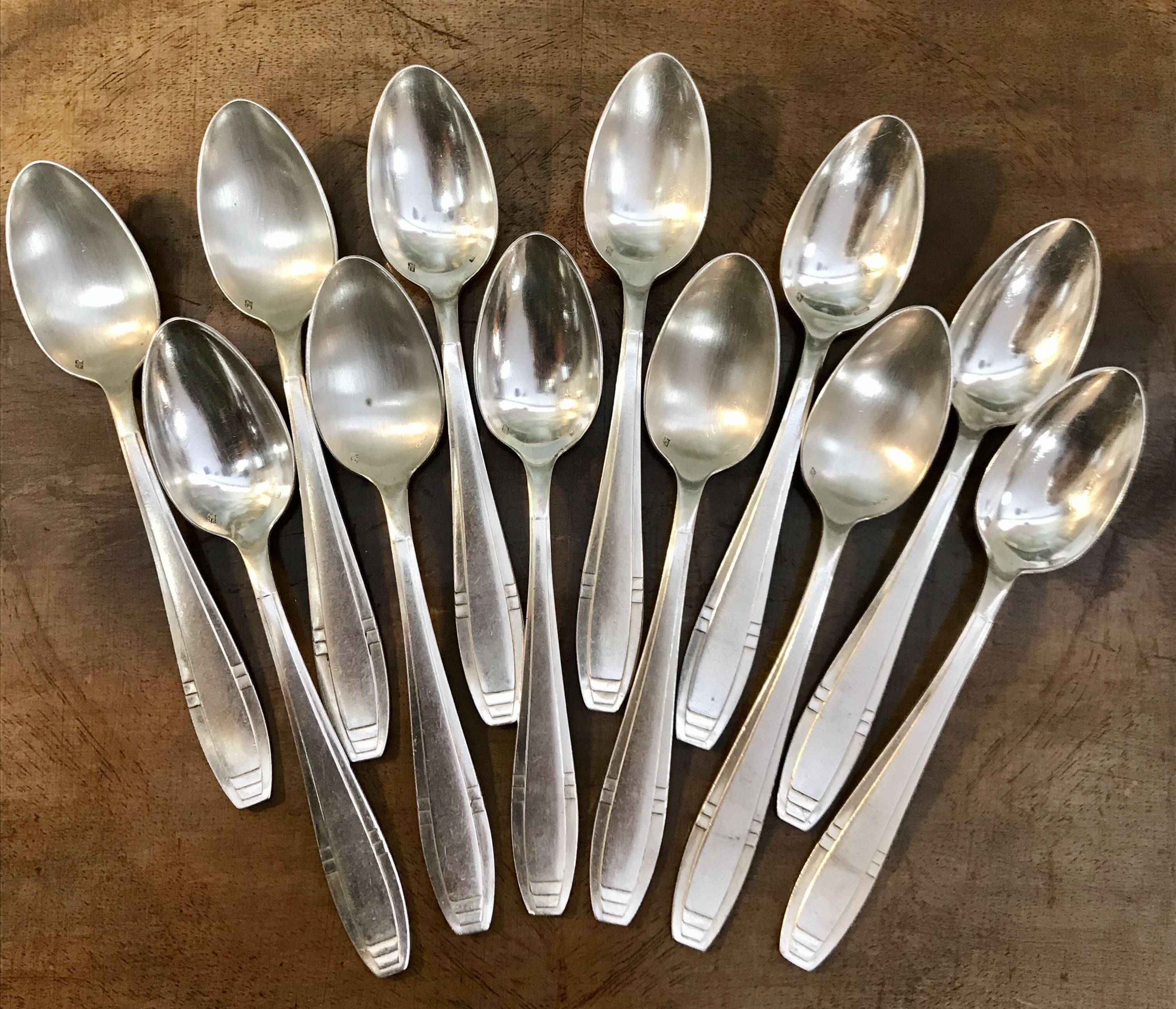 Set of 12 Apollo brand silver-plated metal teaspoons
