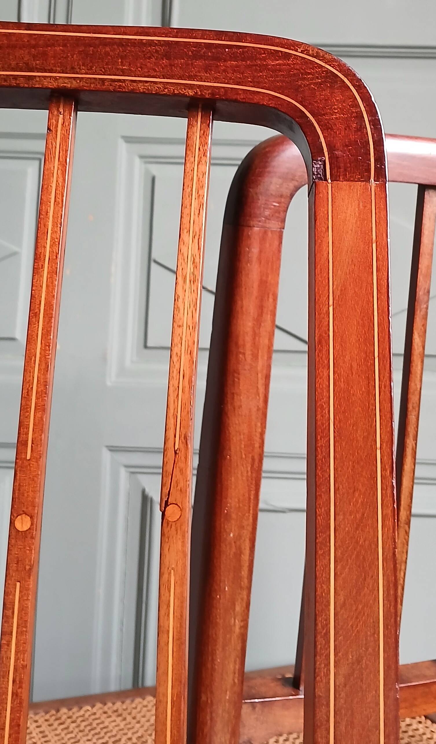 Pair of caned mahogany chairs, circa 1930.