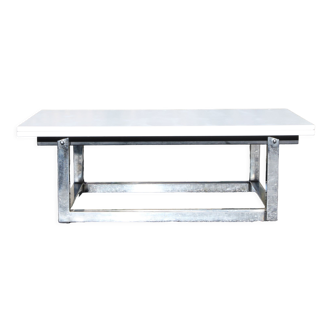 Coffee table convertible into dining table