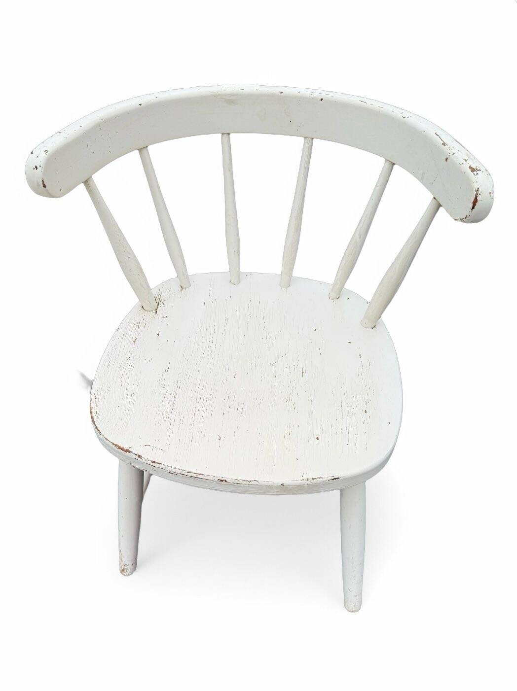 Set of 4 vintage Scandinavian chairs in solid wood.