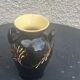 Vintage hand-painted yellow and black glazed ceramic amphora vase