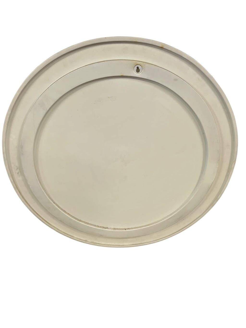 Beige vintage round mirror in a space style / wall mirror
