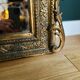 Golden wooden mirror