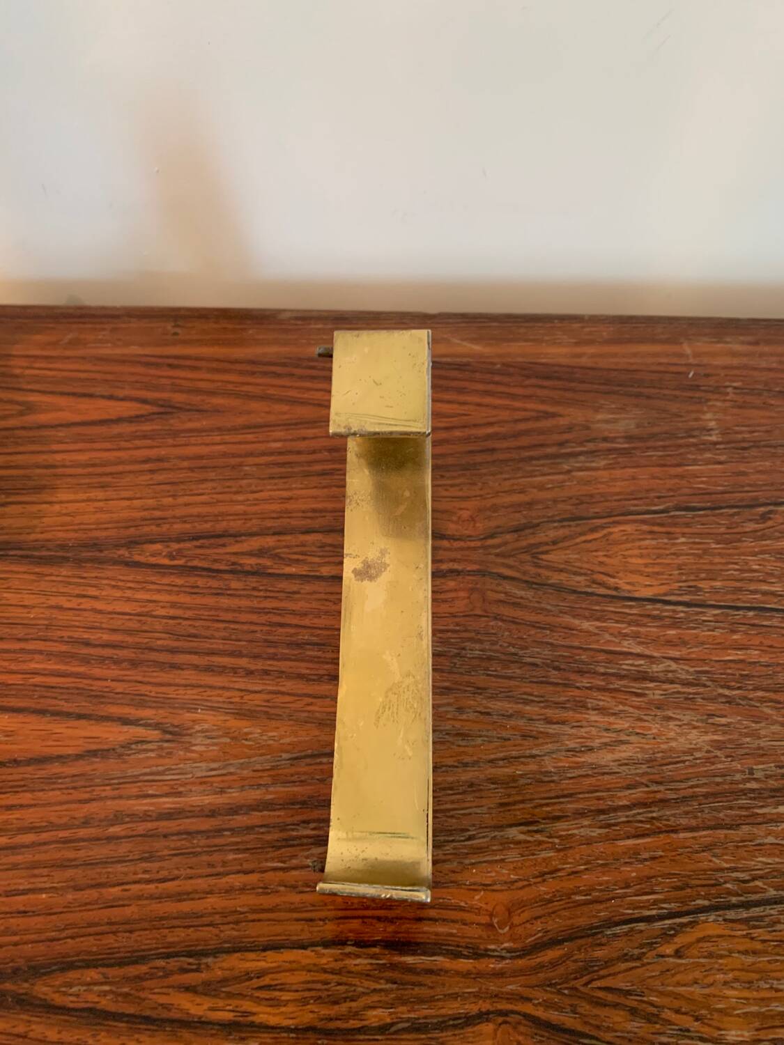 Golden sign letter “T”