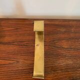 Golden sign letter “T”