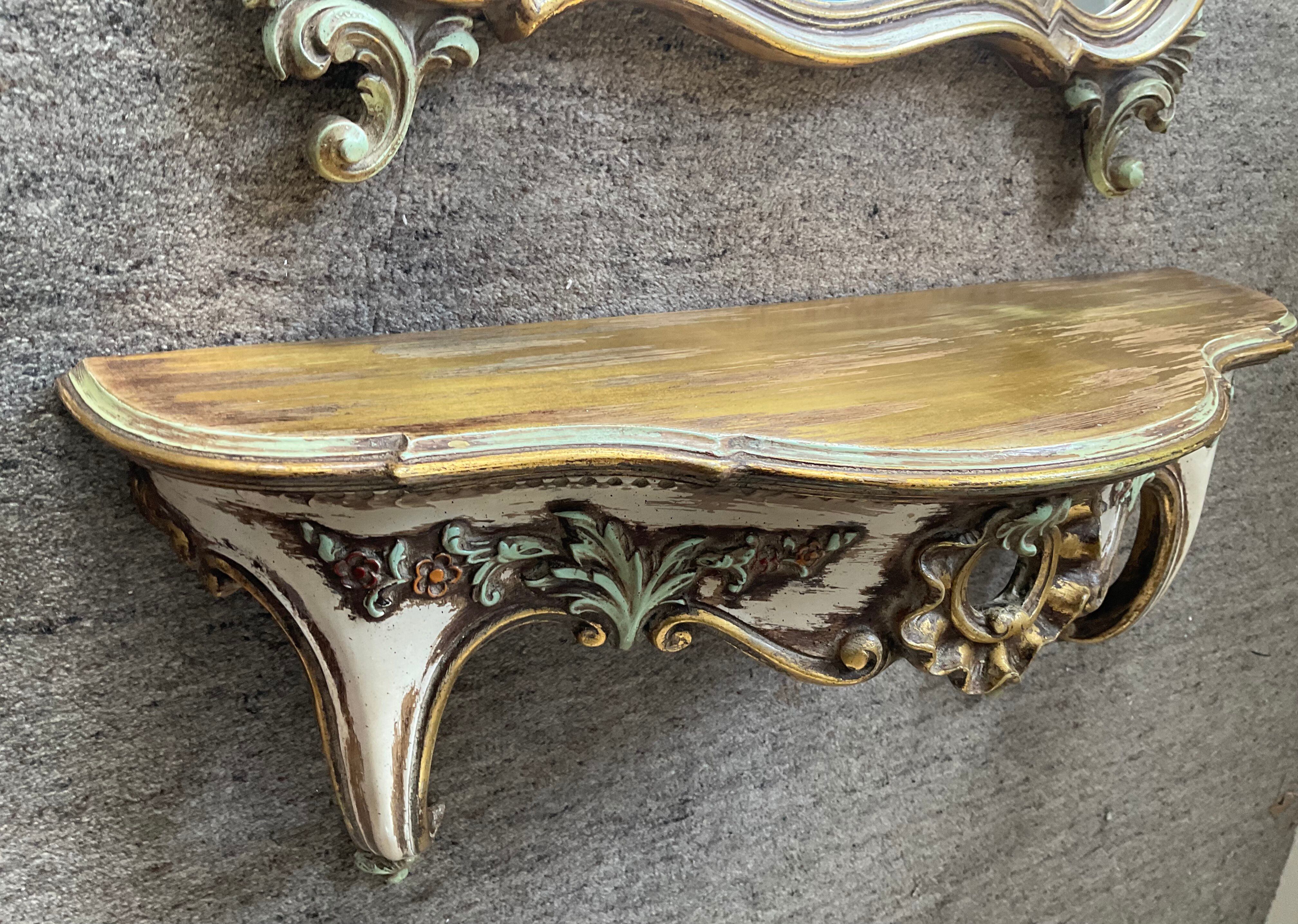 Ancien miroir et console murale en bois sculpté
