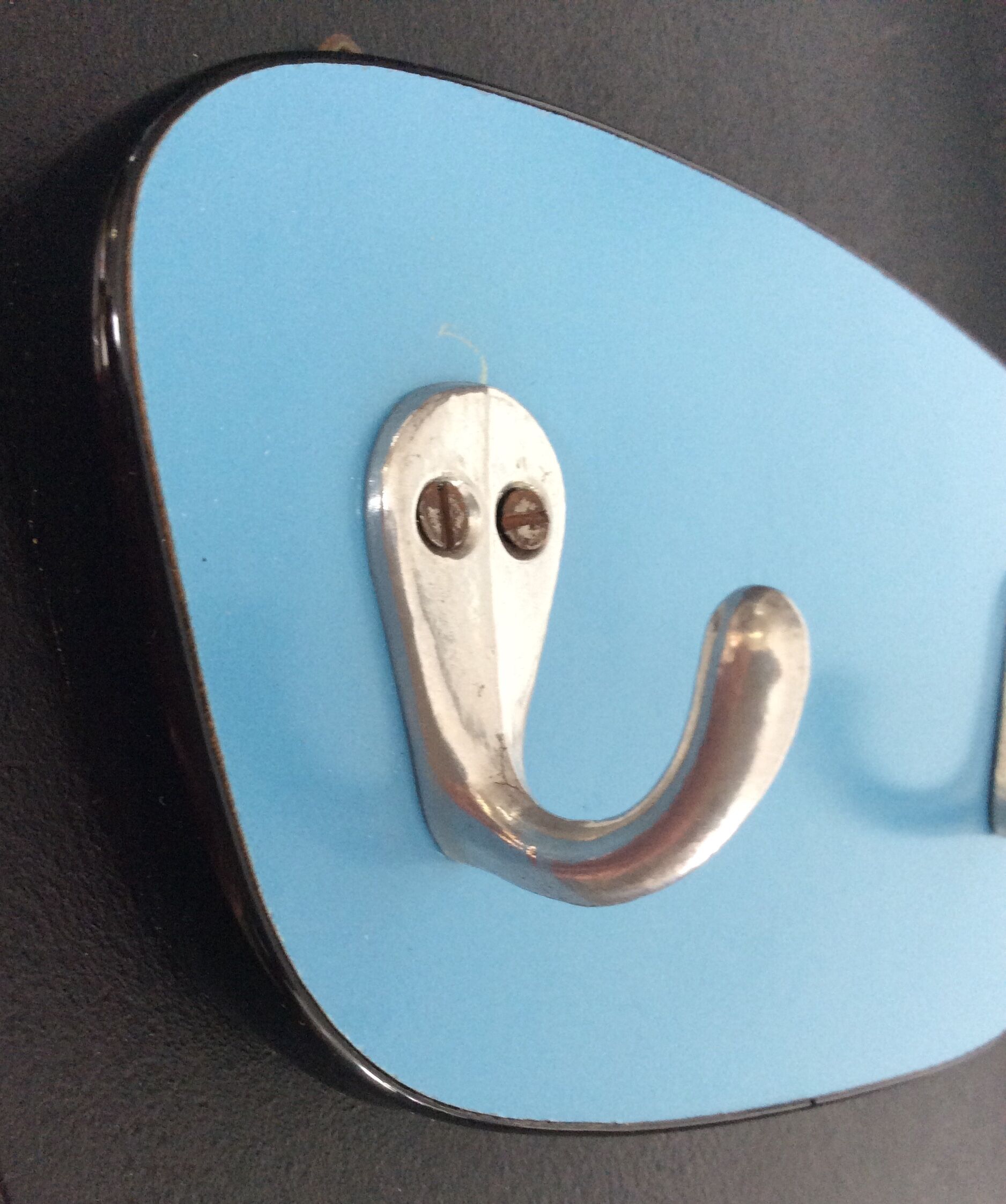 Asymmetrical coat rack in blue formica 60/70