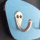 Asymmetrical coat rack in blue formica 60/70
