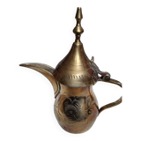 Small carved brass pourer