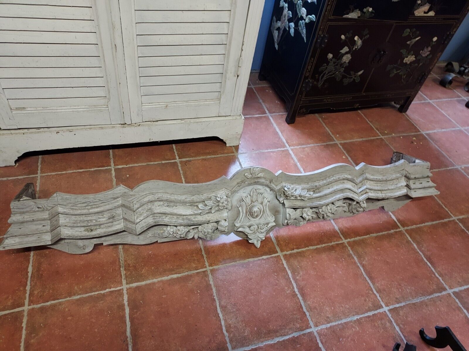 Carved wooden pediment
