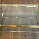 Modernist coffee table in brass and glass tops by Guy Lefèvre for Maison Jansen.
